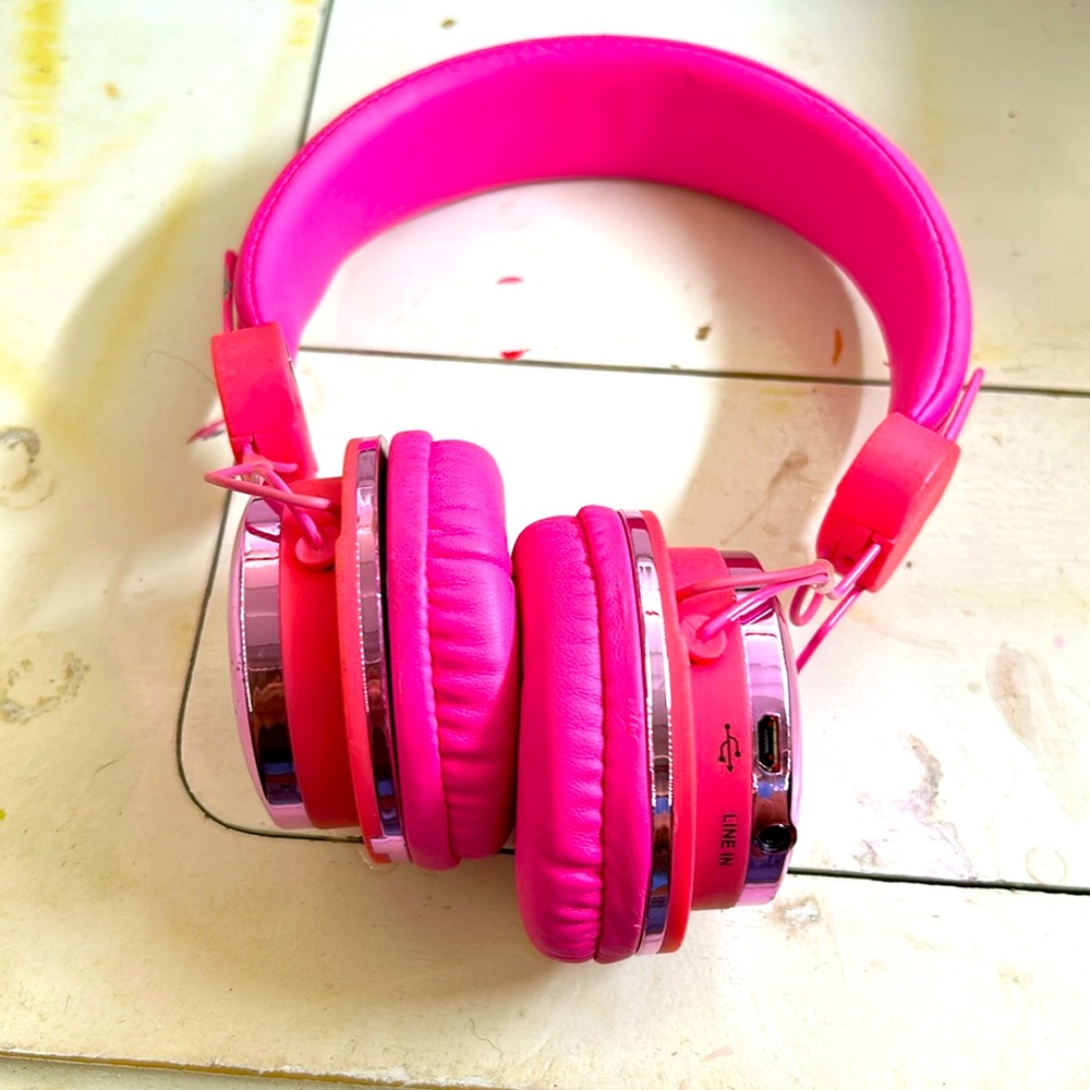 Pink Bluetooth headphones